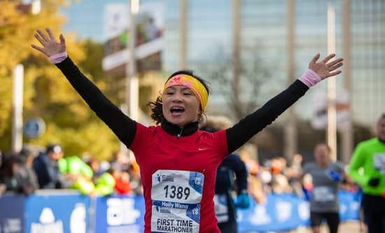 Woman Celebrating Monumental Marathon